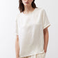 Ivory relaxed silk top front view with crew neck and short sleeves