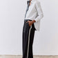 Striped button-down blouse with vertical light gray and white stripes, long sleeves