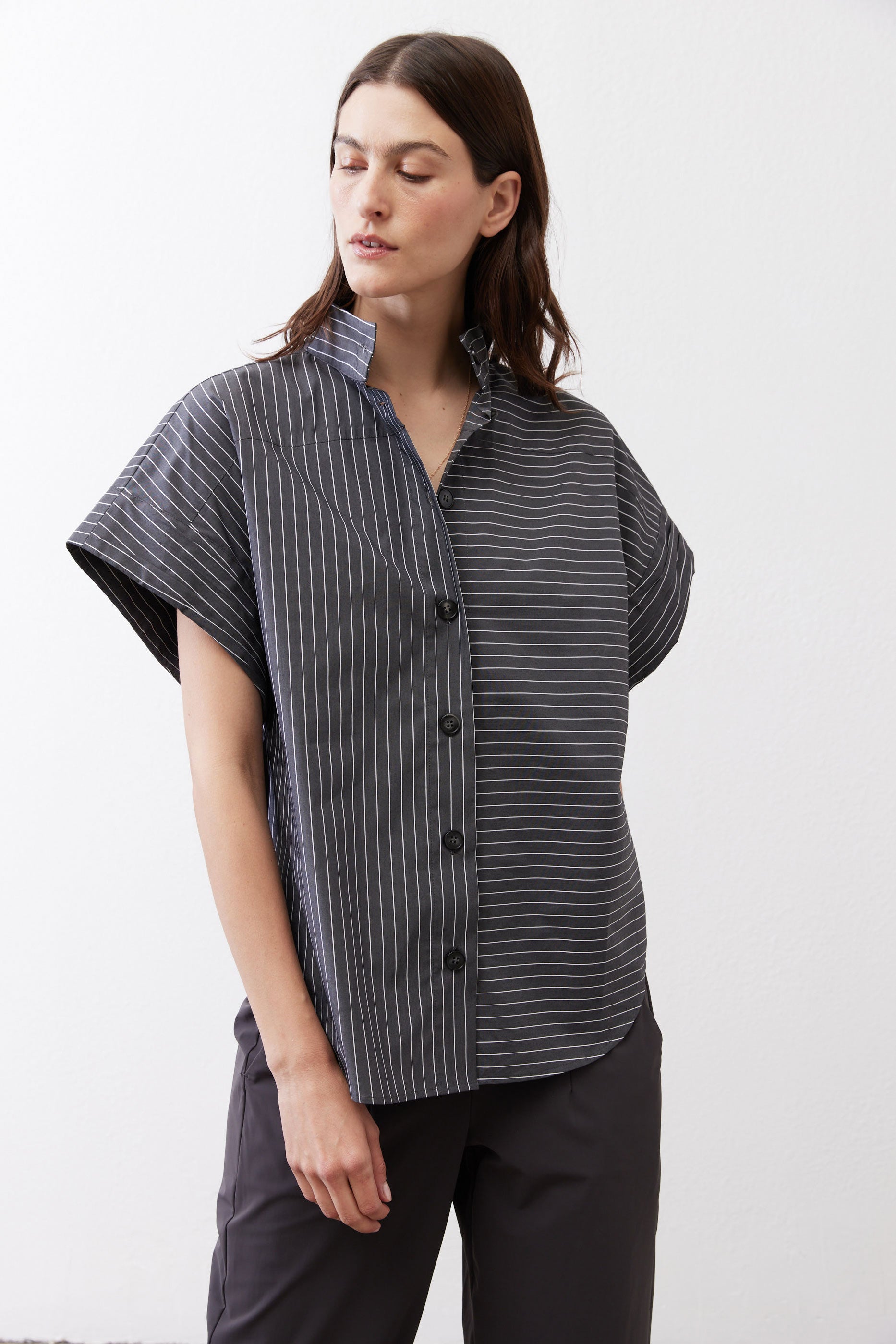 Gray striped button-up blouse with short sleeves and front button placket
