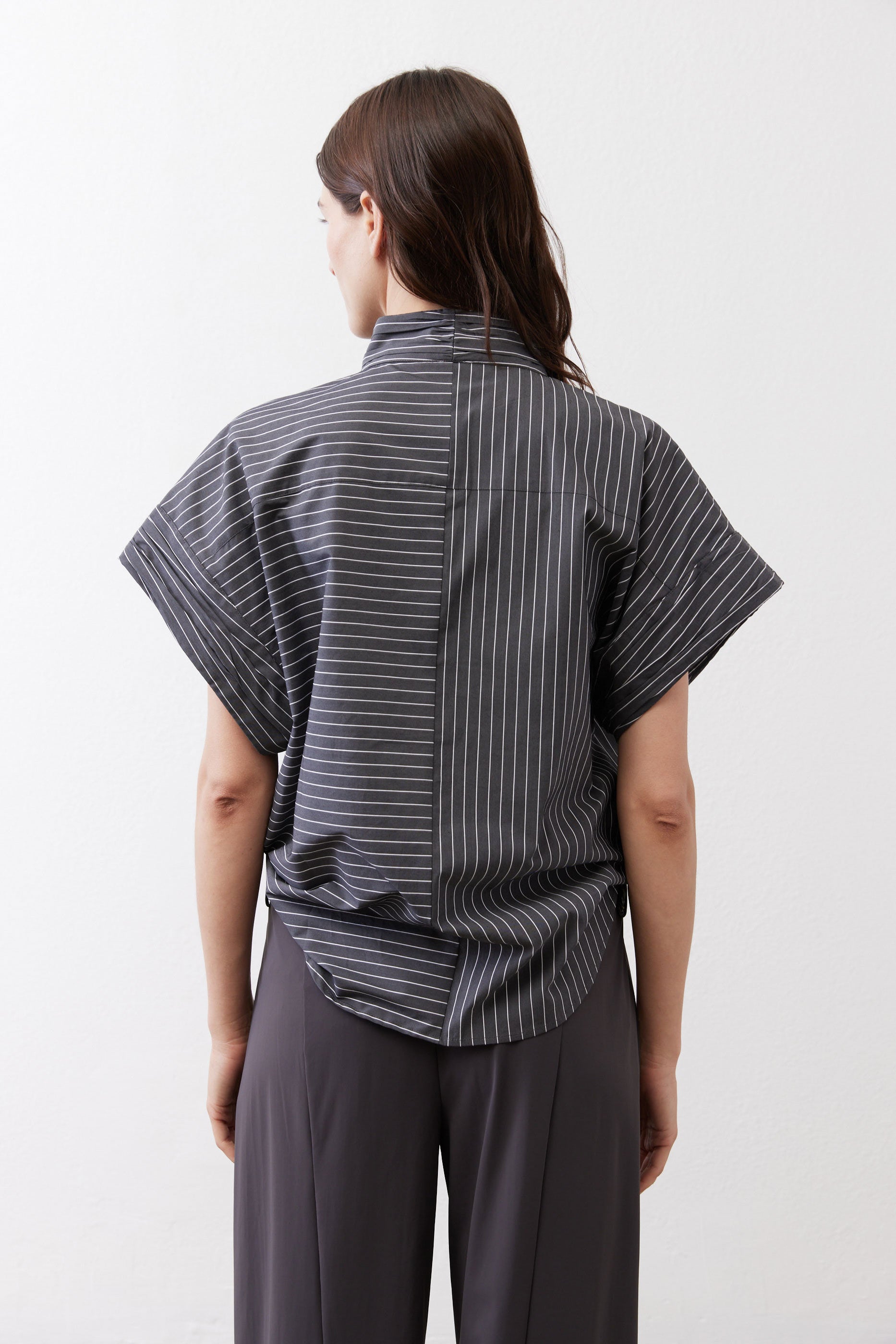 Gray striped back of button-up blouse with short batwing sleeves
