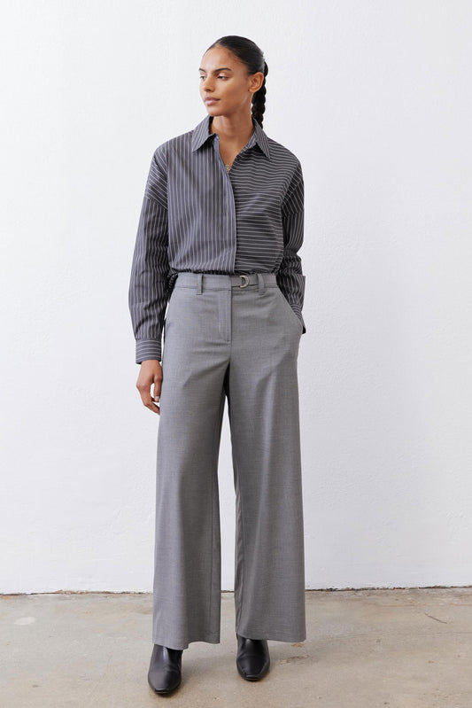 Gray-and-white striped button-down blouse with pointed collar and button front