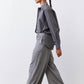 Gray-and-white striped button-down blouse with pointed collar and long sleeves
