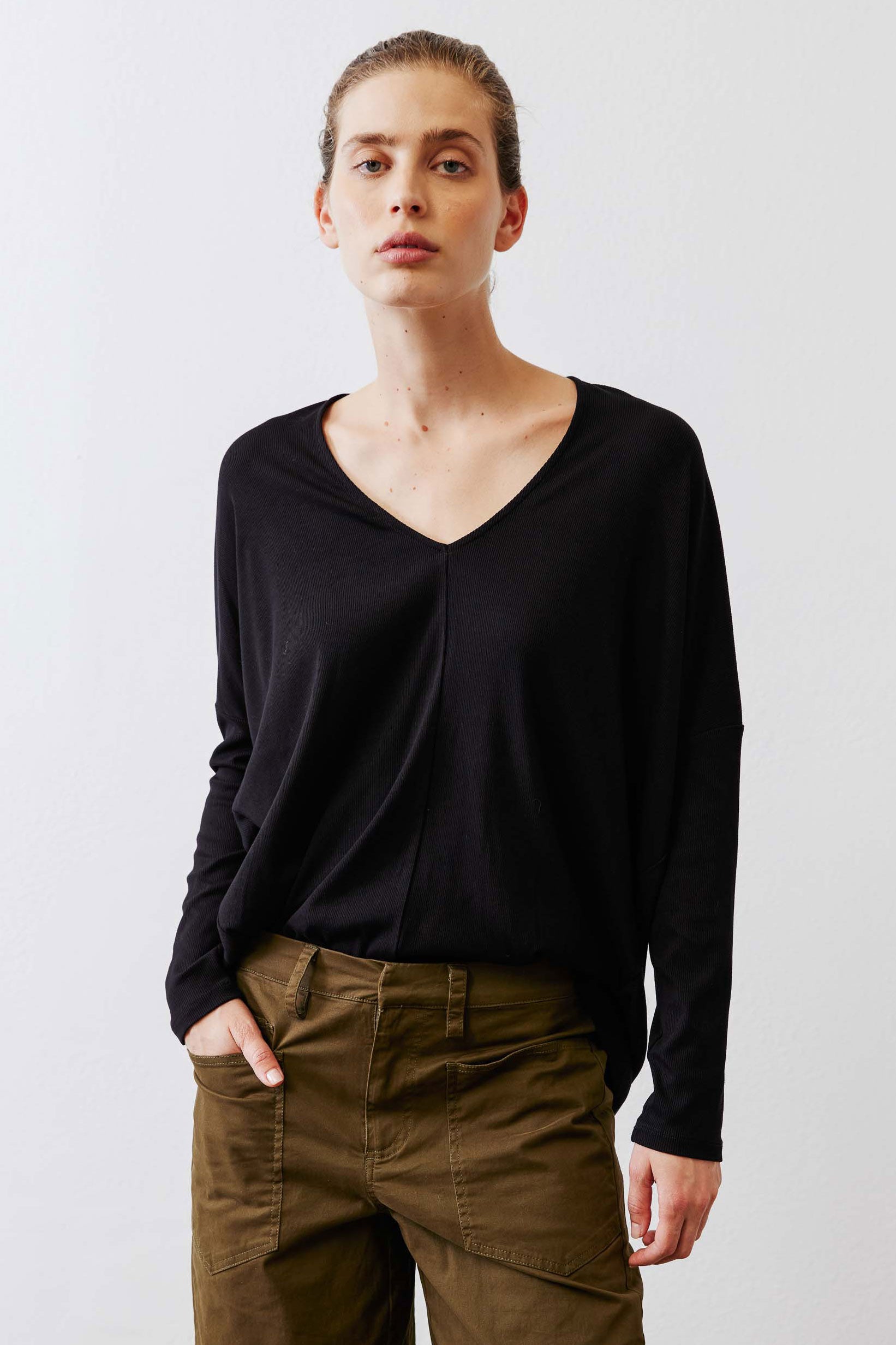 Black ribbed dolman long sleeve top, V-neckline and relaxed fit