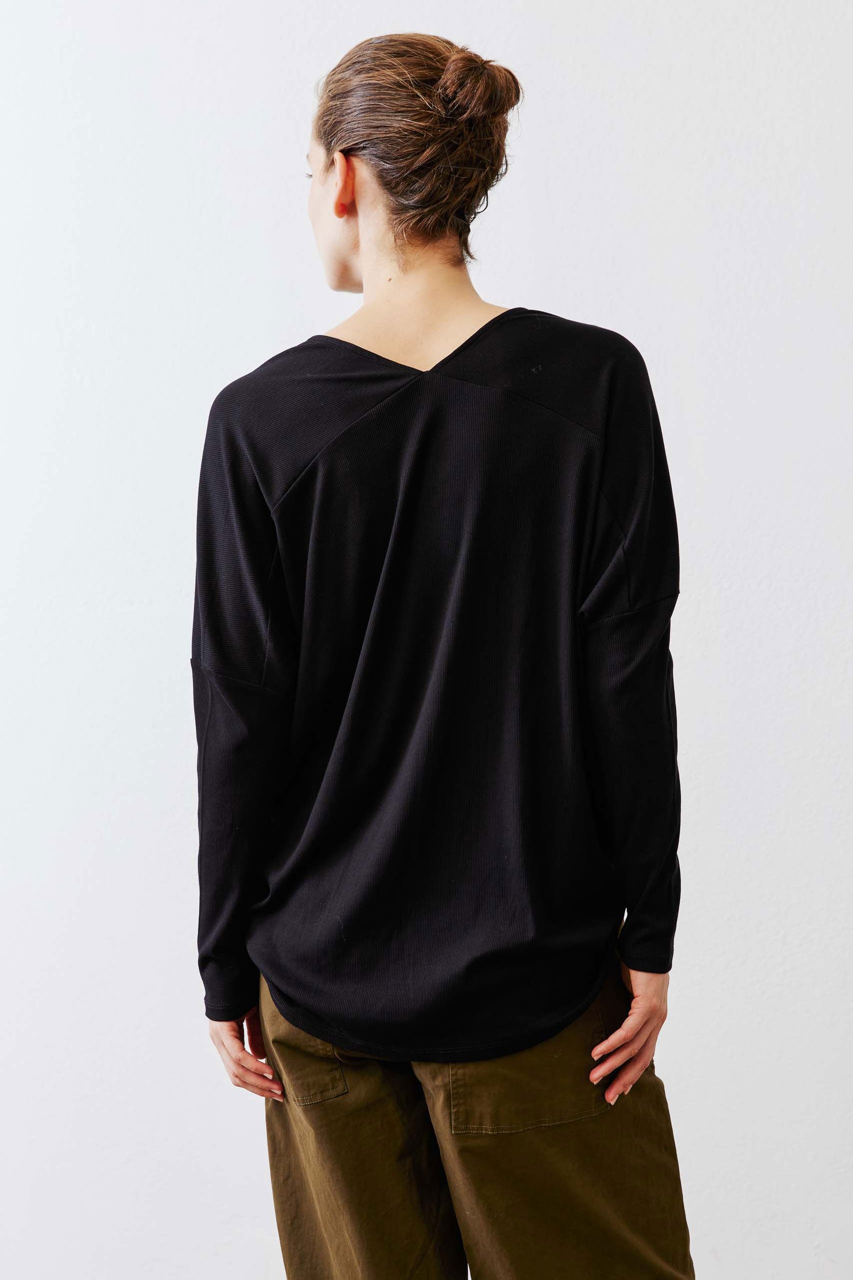 Black ribbed dolman long sleeve top, V-back and relaxed straight hem
