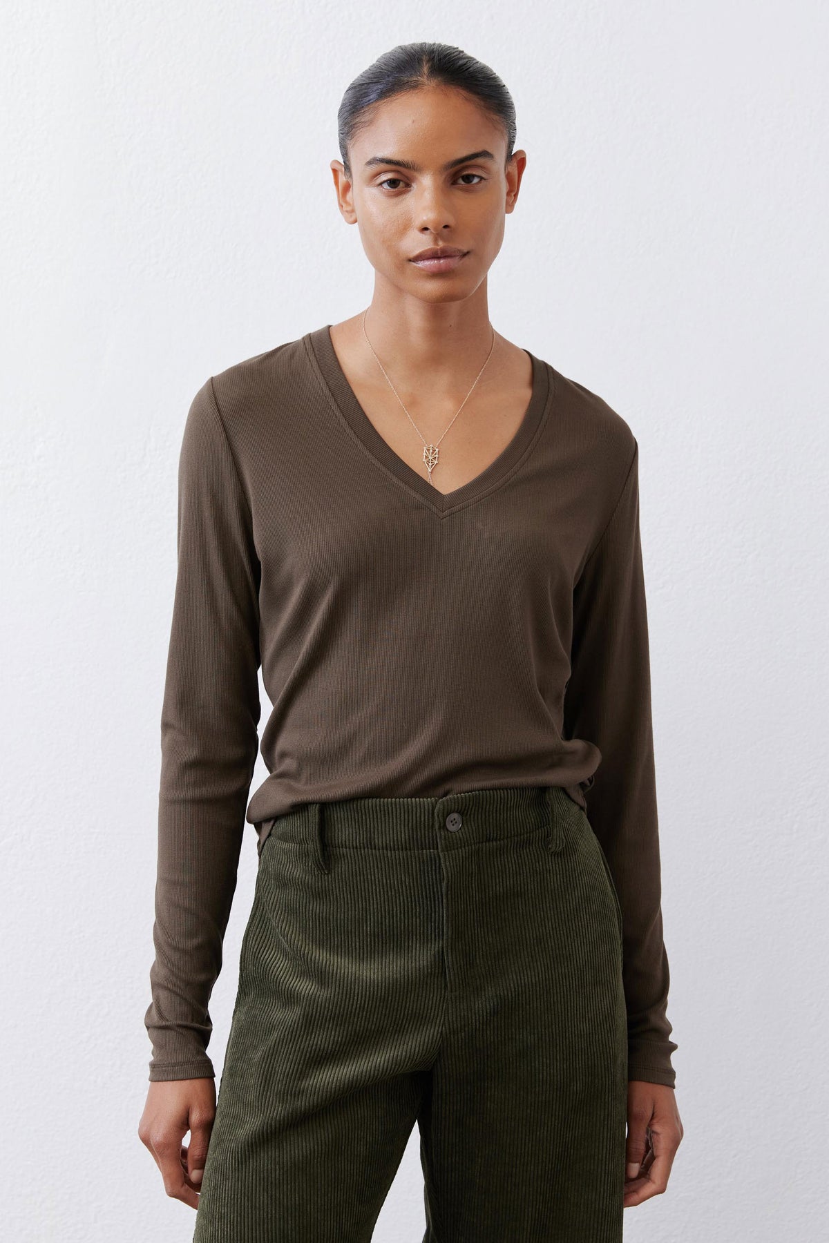 Olive-brown ribbed V-neck long-sleeve top, close front view