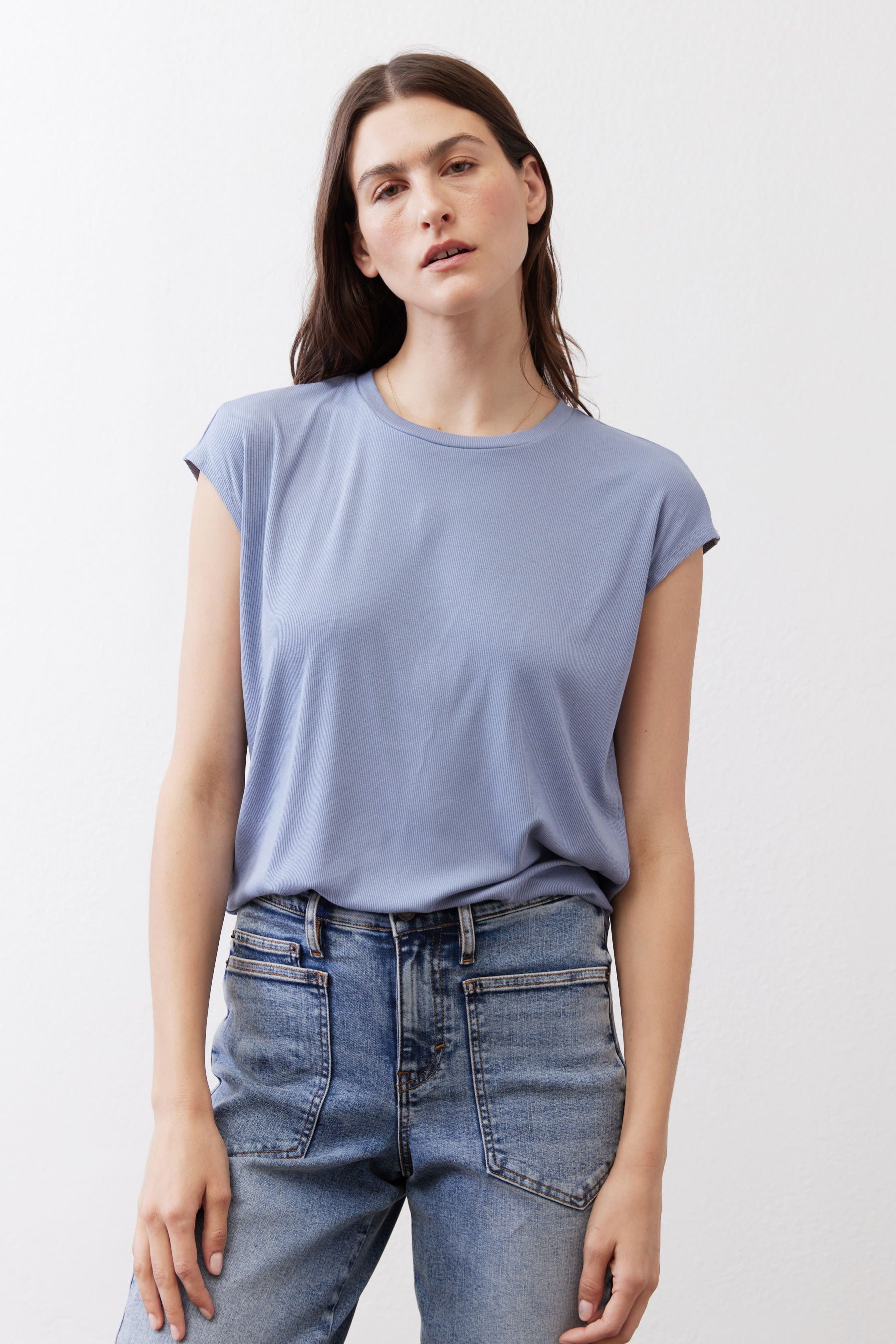 Light blue ribbed crew-neck tee with short sleeves, smooth drape