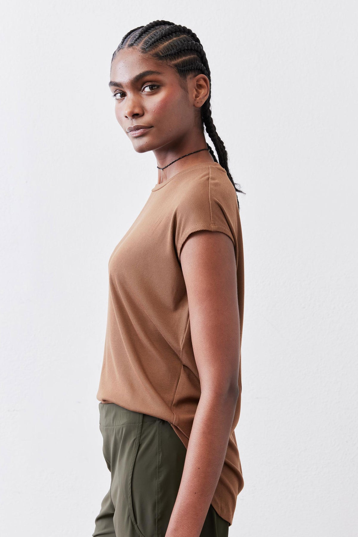 Deep oak ribbed tuck-in tee side view with short sleeves and crew neck