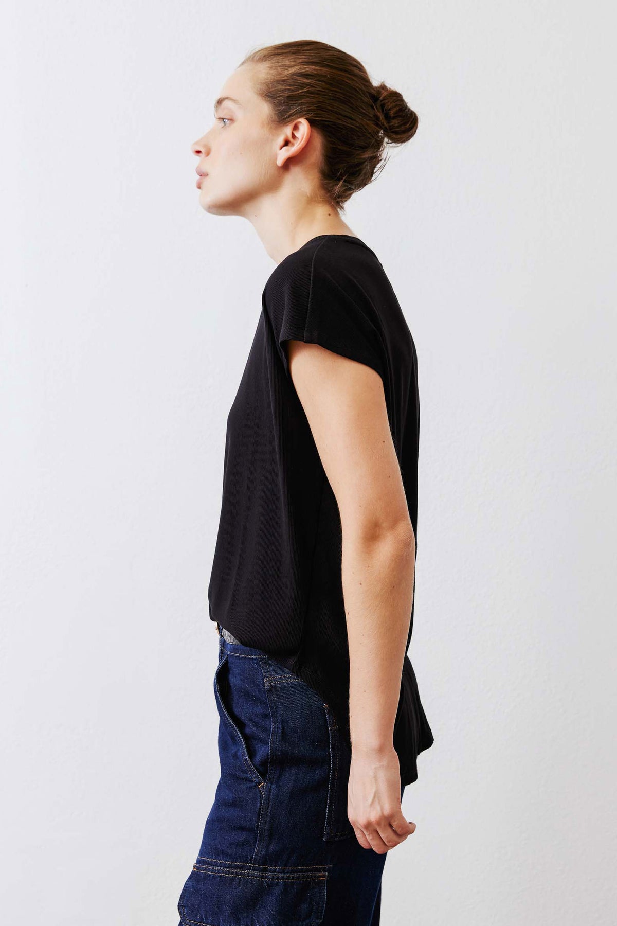 Black ribbed crewneck tee, short sleeves, draped relaxed fit