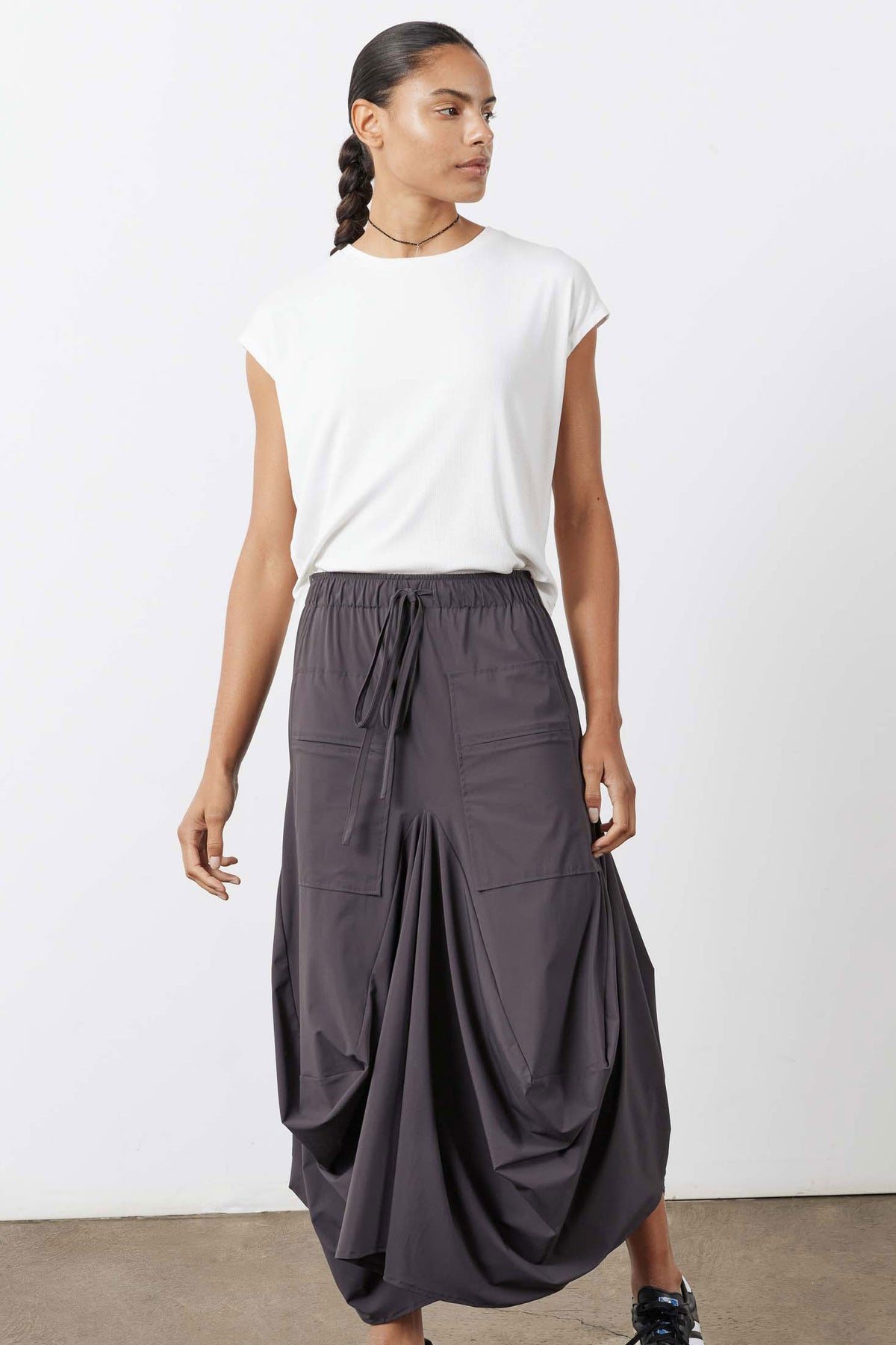 White ribbed tuck-in tee, relaxed fit with short sleeves and crew neck