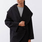 Black shawl-collar wrap coat, open front with hidden-seam detailing