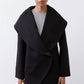 Black shawl-collar wrap coat with asymmetric drape and two front slant pockets