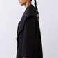 Black shawl-collar wrap coat with angled hem and long sleeves