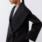 Black shawl-collar wrap coat with open front and long cuffed sleeves