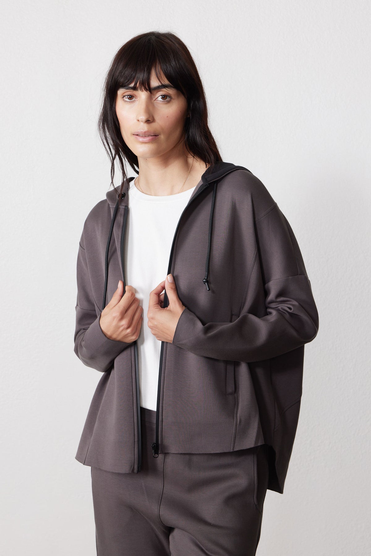 Storm gray zip hoodie with drawstring hood, shown open at the front.