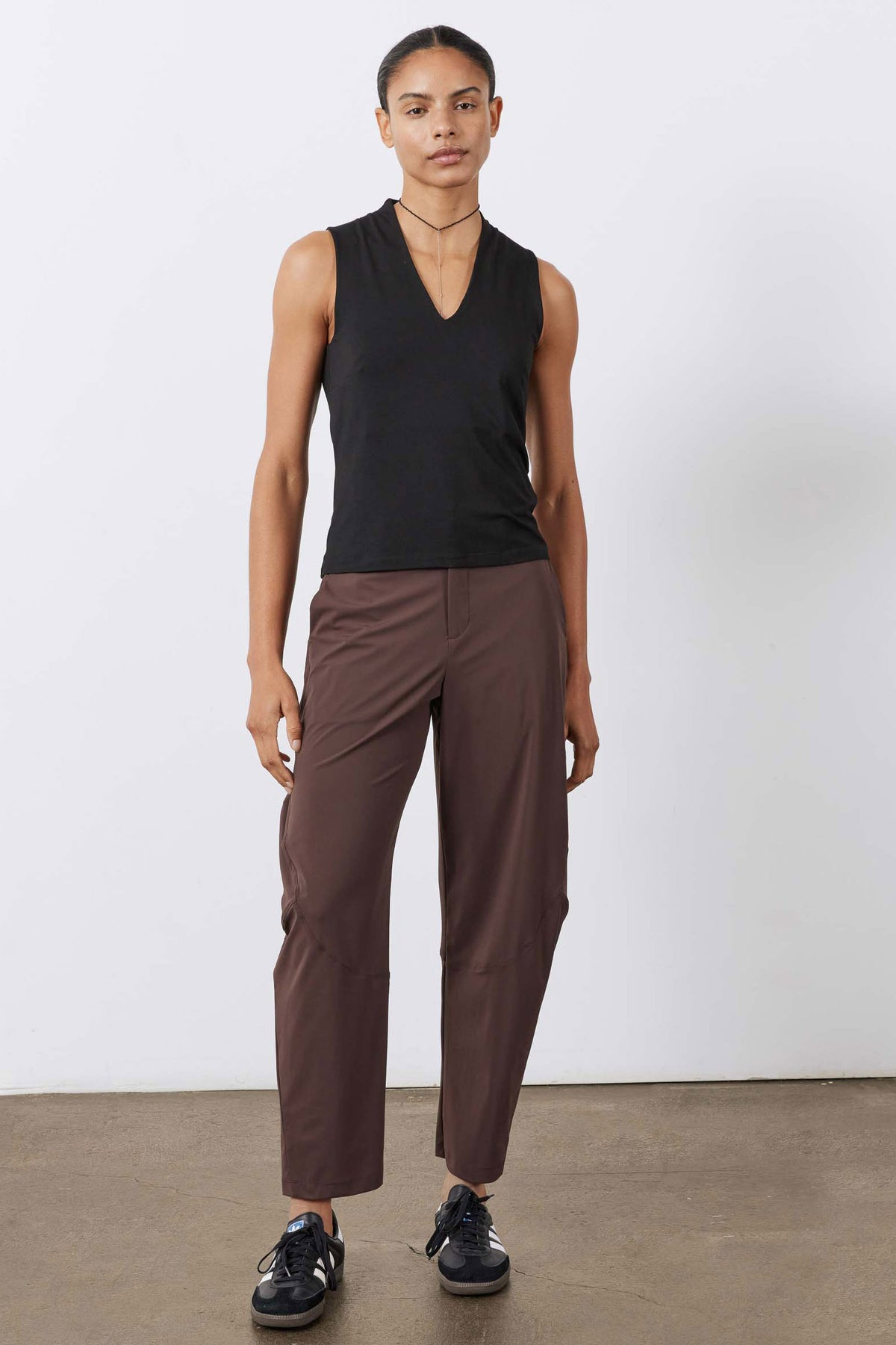 Black V-neck sleeveless tank top, front view