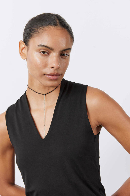 Black sleeveless V-neck sculpted tank top