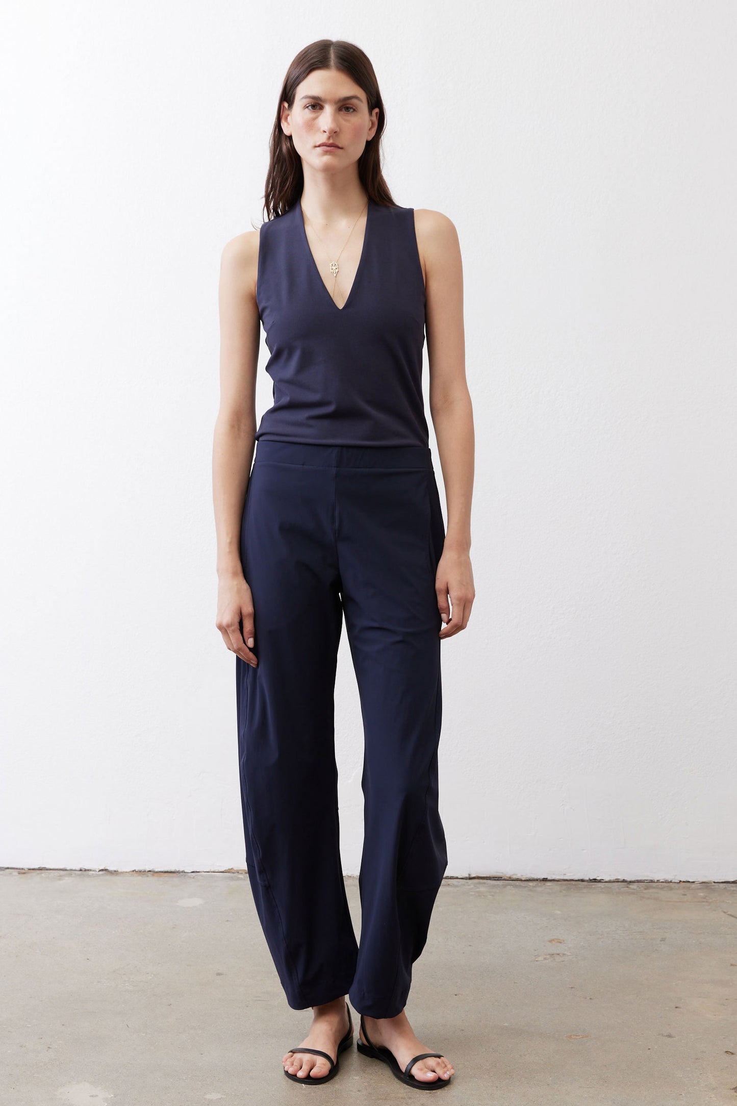 Sculpted tank top in deep sea blue with V-neck and sleeveless silhouette
