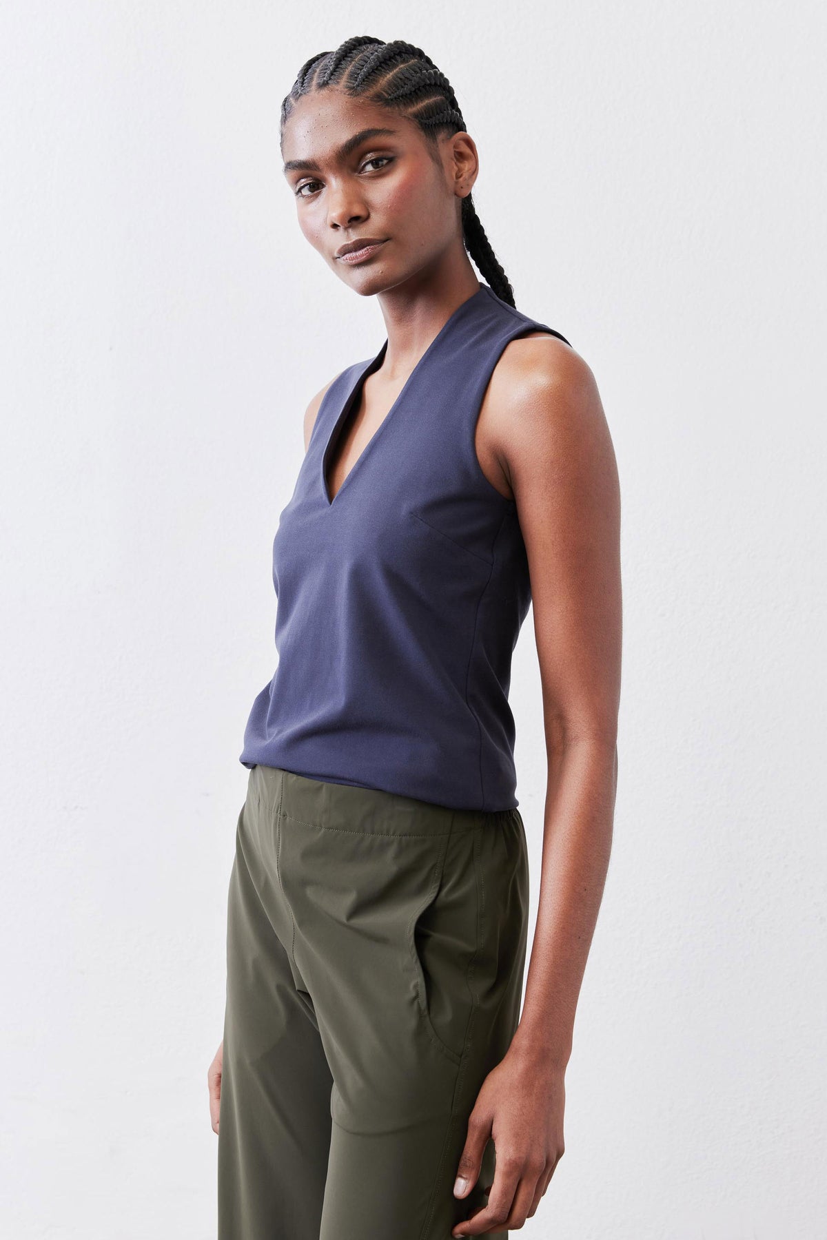 Sculpted tank top in deep sea blue with V-neck and sculpted waist seam