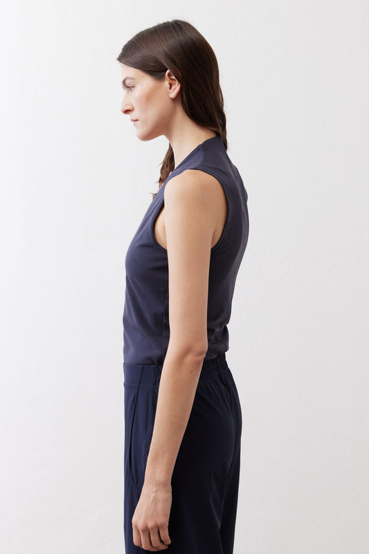 Sculpted tank top in deep sea blue with V-neck and smooth side drape