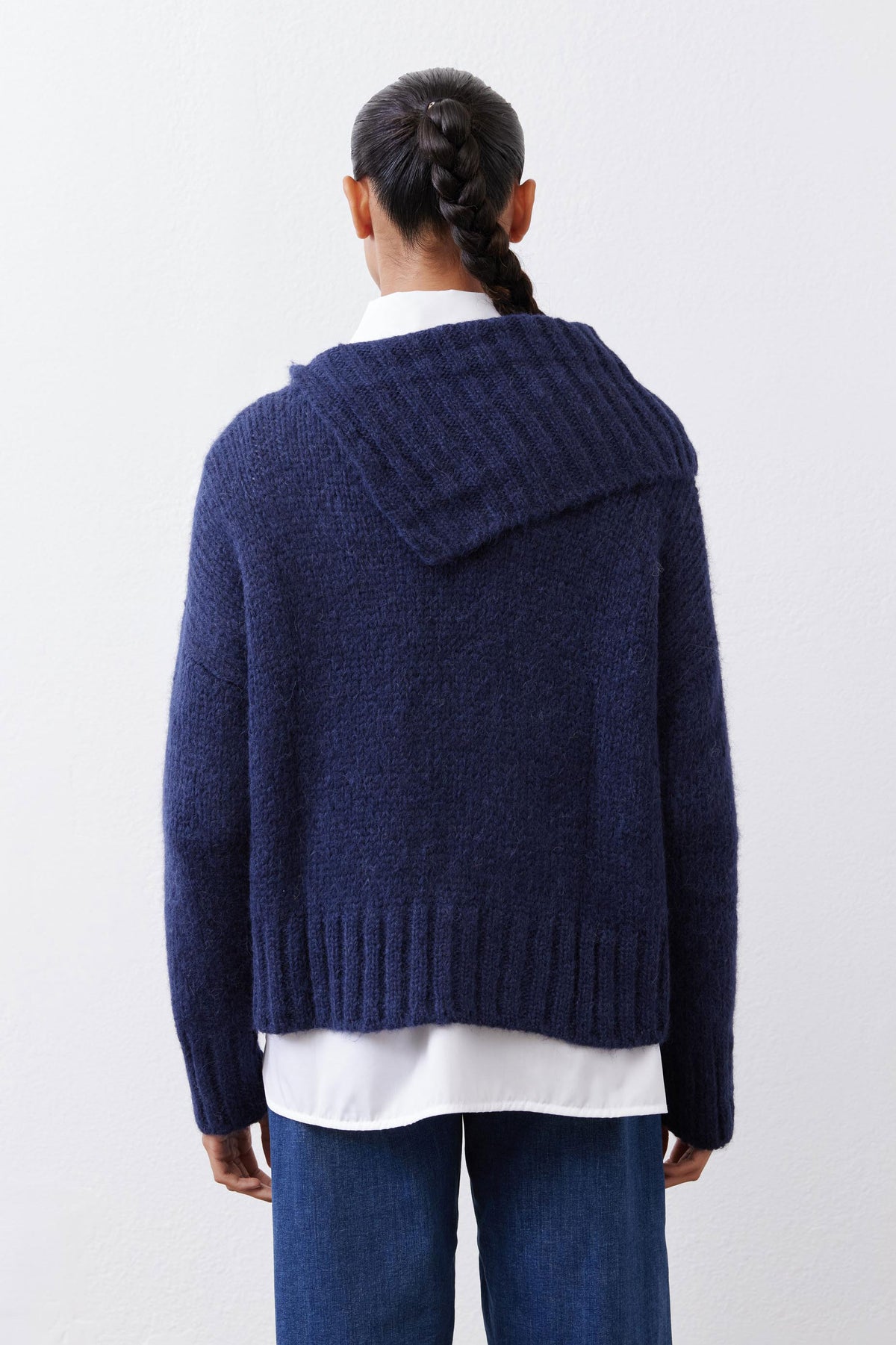 Midnight navy shawl-collar sweater back view with ribbed hem and cuffs