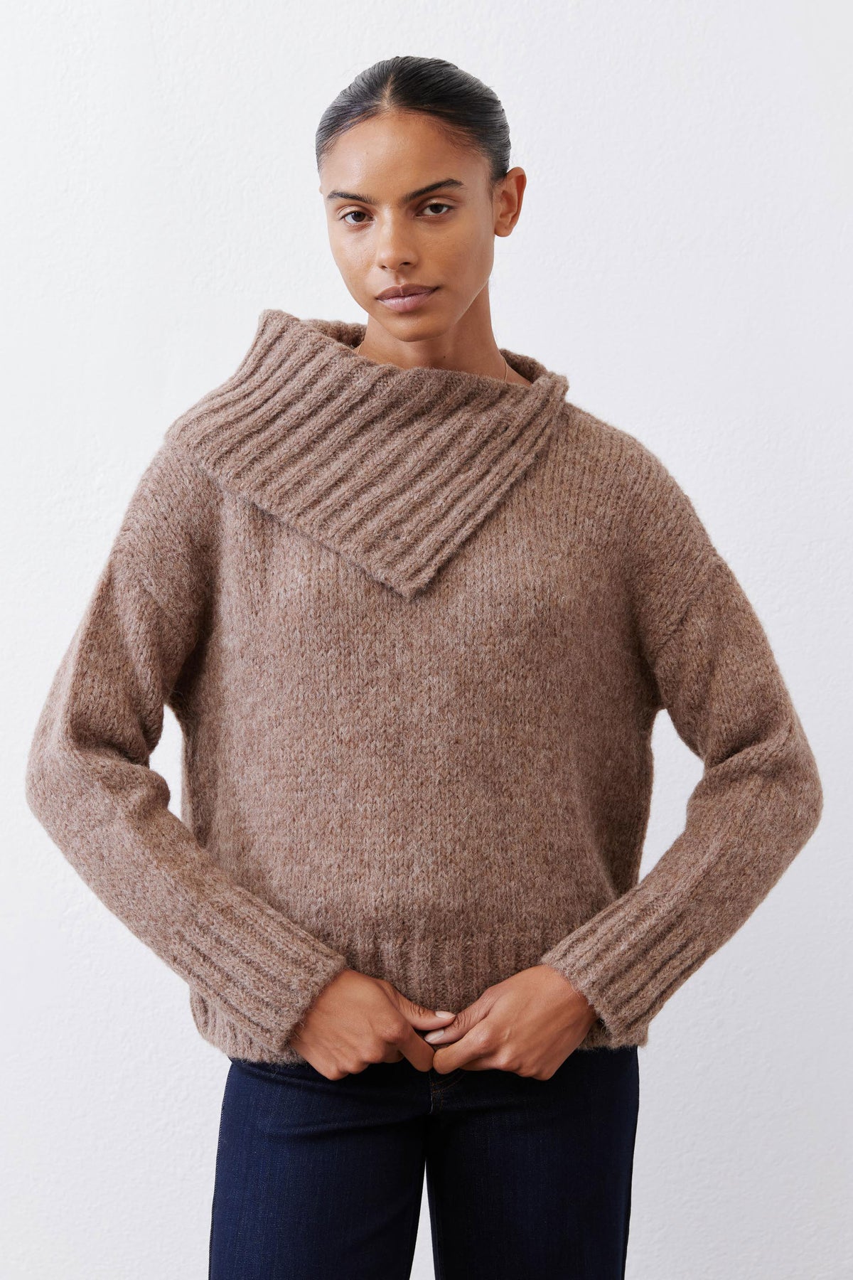 Taupe melange shawl-collar sweater, long sleeves and ribbed cuffs, close front.