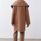 Fawn shawl-collar wrap coat back view with wide collar and relaxed fit