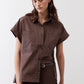 Chocolate short-sleeve button-down blouse with point collar and visible chest pockets