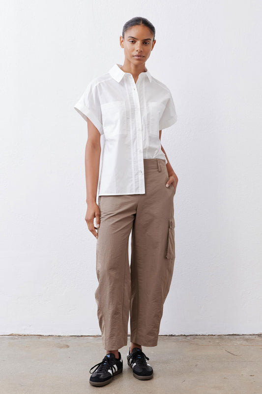 White short-sleeve button-down blouse with patch pockets and relaxed fit