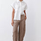 White short-sleeve poplin button-down blouse with pointed collar and front button placket