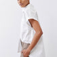 White short-sleeve button-down blouse, side view with high collar