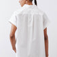 White short-sleeve button-down blouse, back view with collar and yoke seam