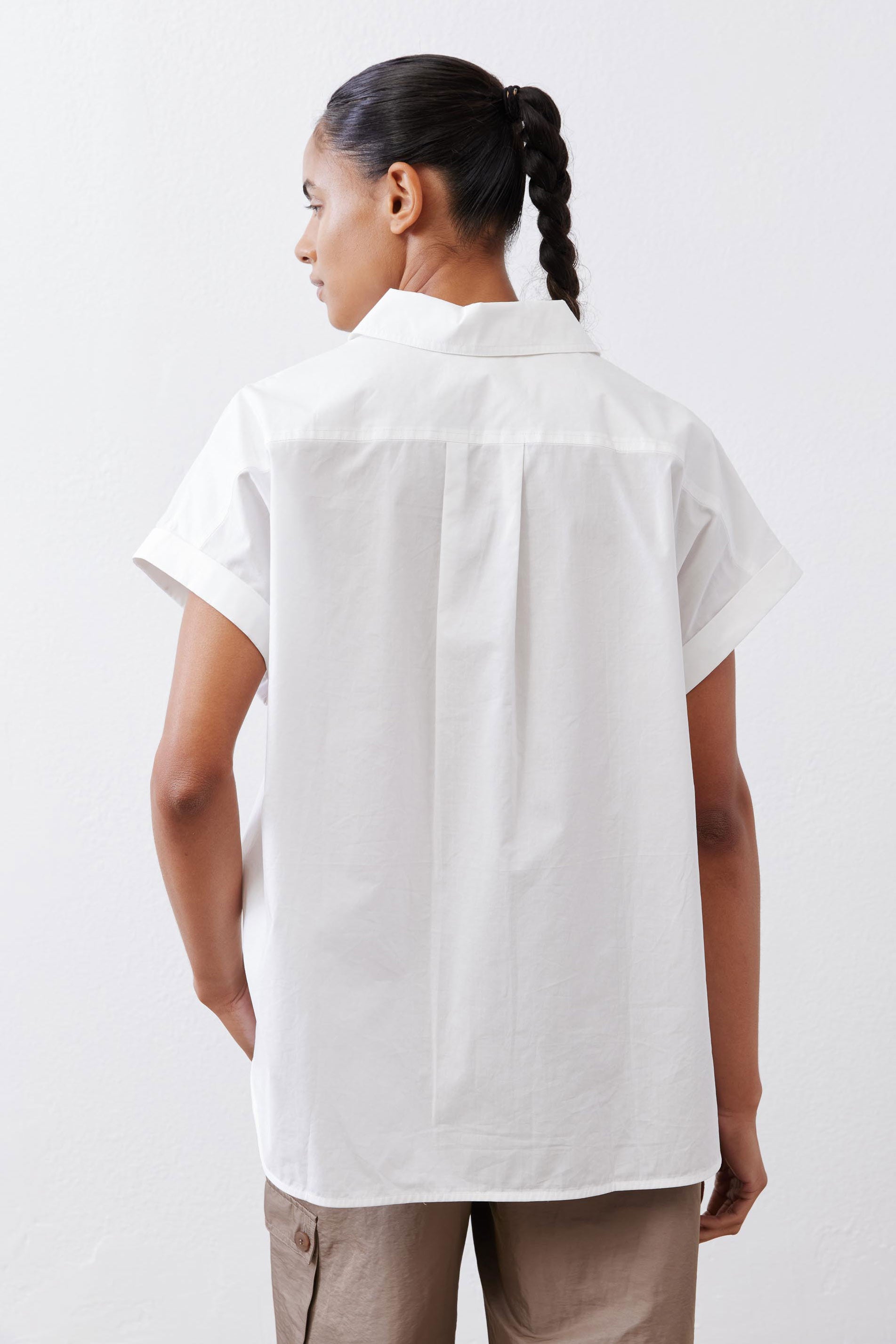 White short-sleeve button-down blouse, back view with collar and yoke seam