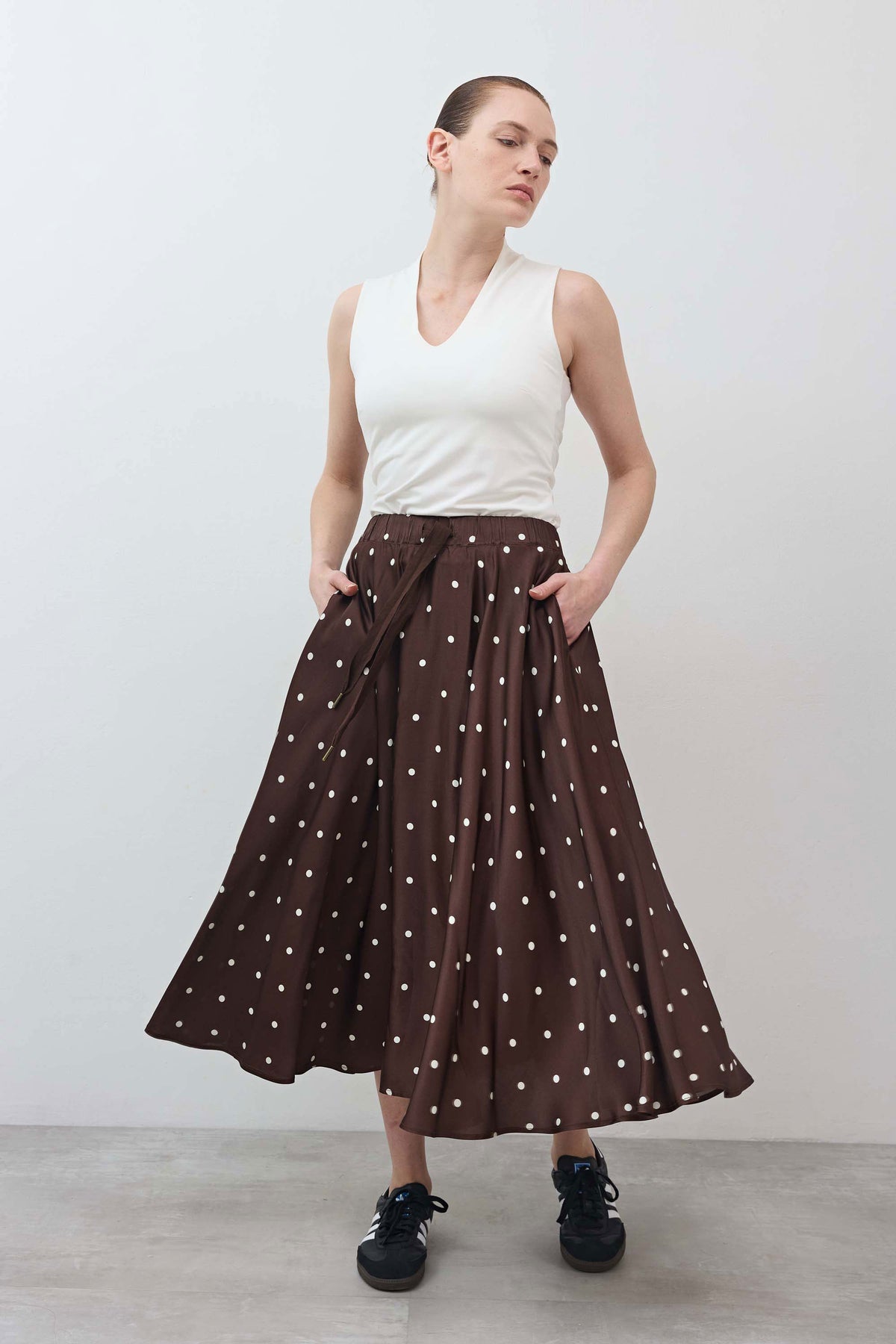 Brown pull-on maxi skirt with white polka dots and gathered pleats