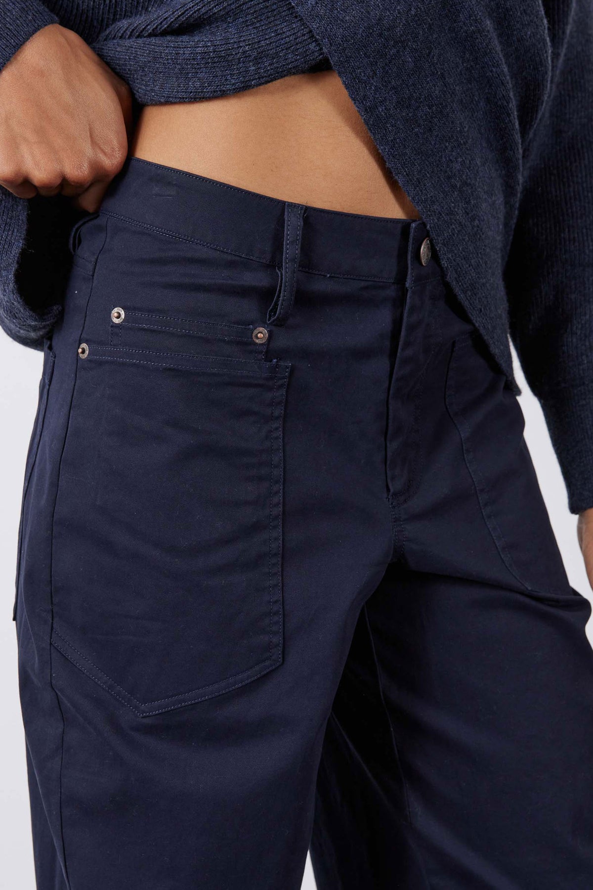 Deep sea twill pants with snap-button cargo pockets, close-up back view