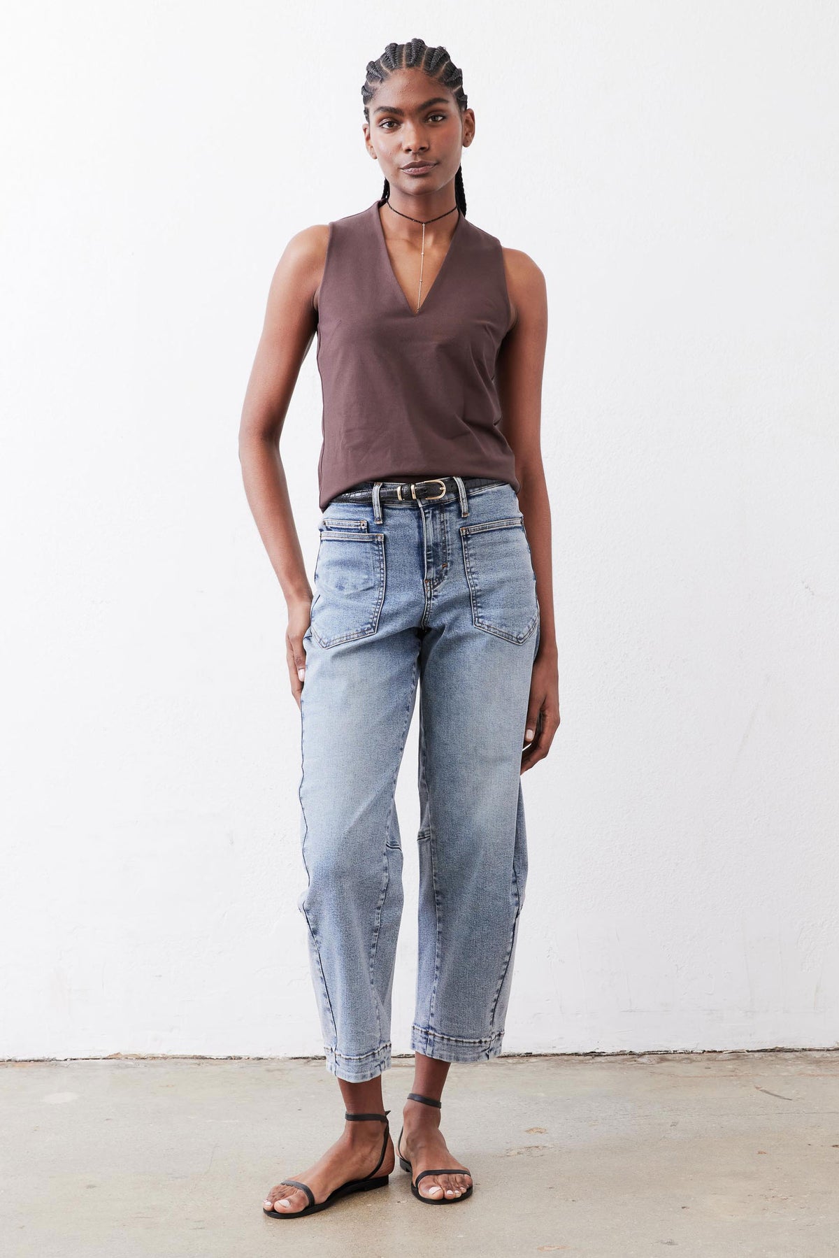Light blue slouchy jeans with relaxed straight legs and stitched hems