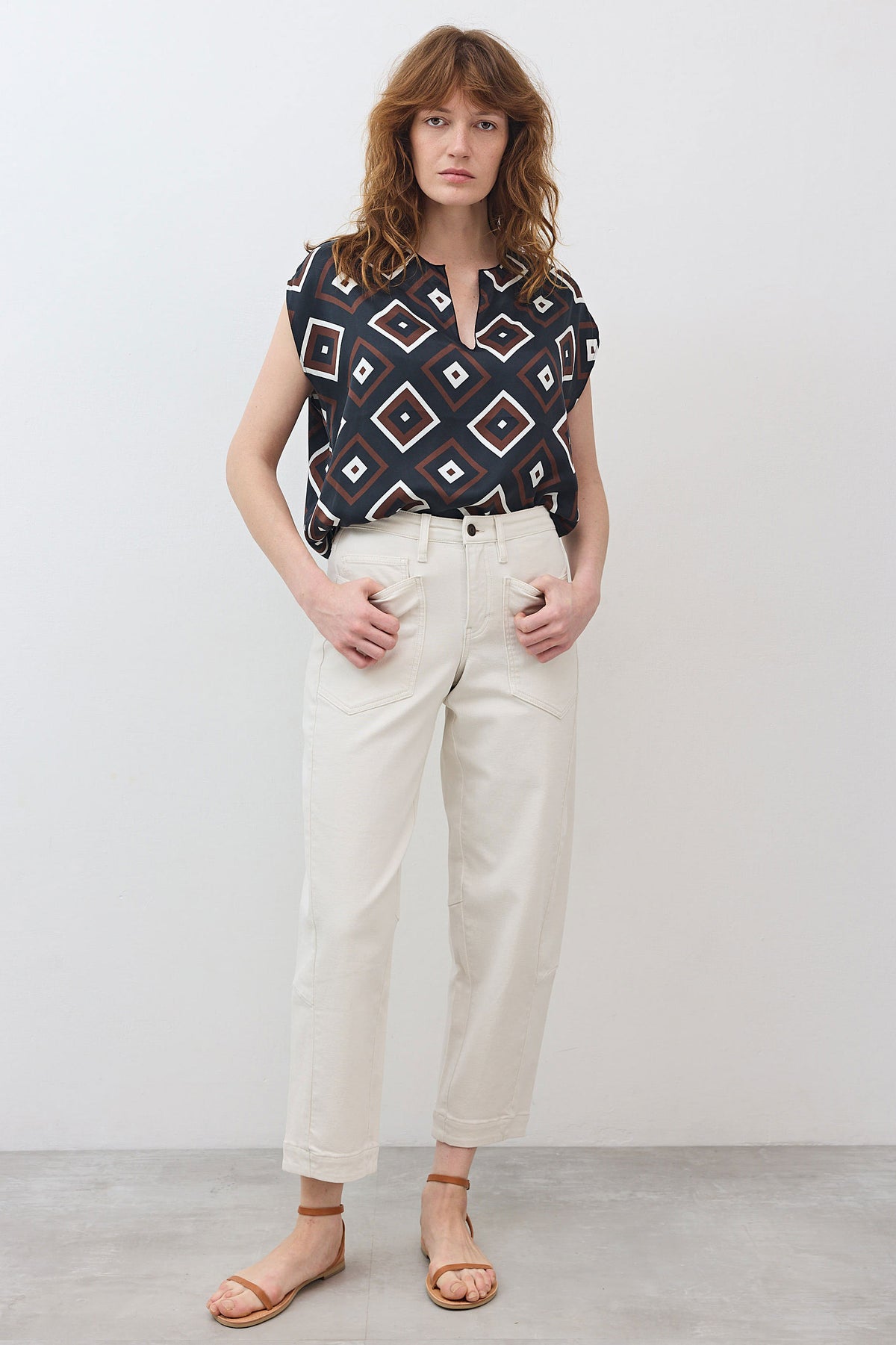 Vintage white wash slouchy jeans with straight relaxed legs and front button closure