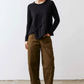 Olive slouchy twill pants with elastic waistband and front pockets, model full view