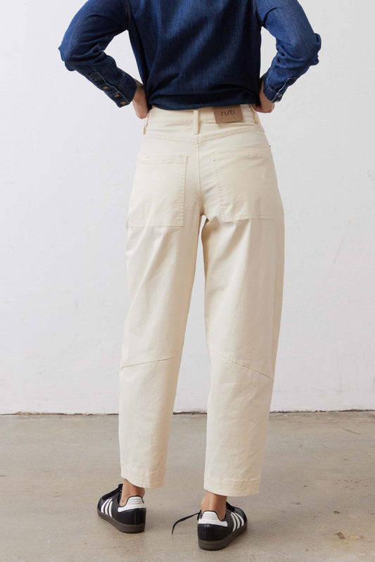 Ecru slouchy soft twill pants, back view with patch pockets and center back seam