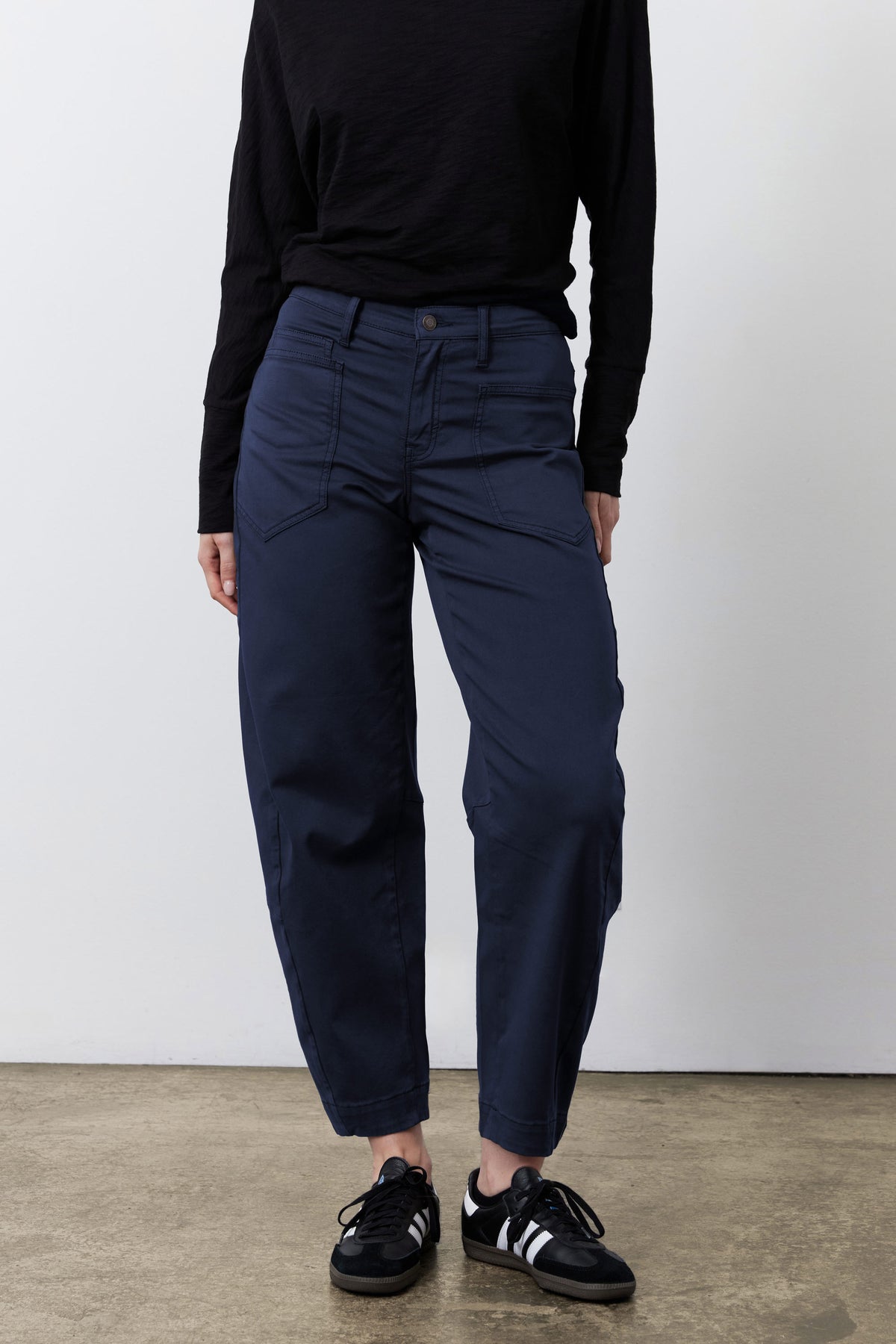 Deep sea slouchy twill pants with gathered waistband and cuffed hems, back view