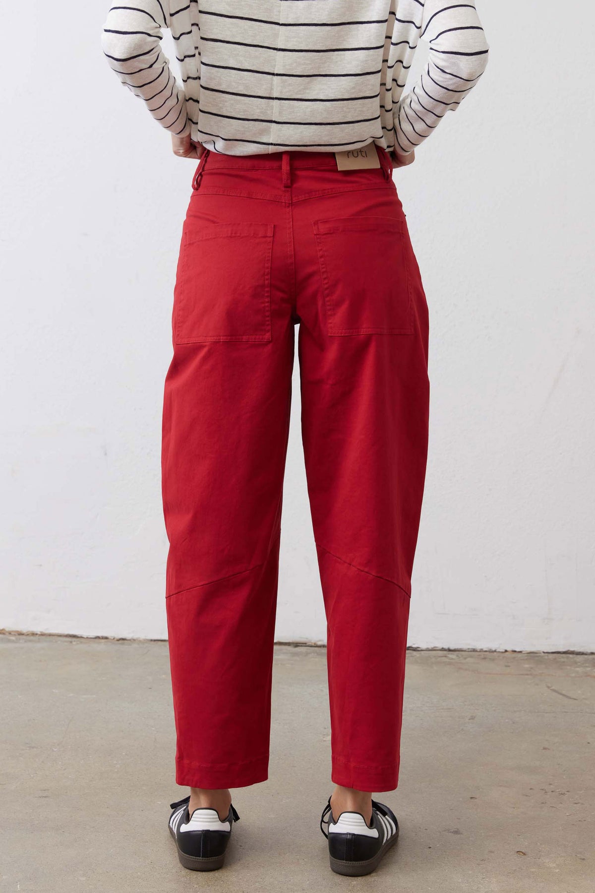 Scarlet twill pants, front view, belted waist with button fly and deep front pockets