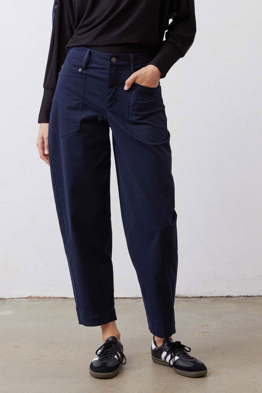 Washed navy slouchy twill pants, front view with belt loops and utility pockets