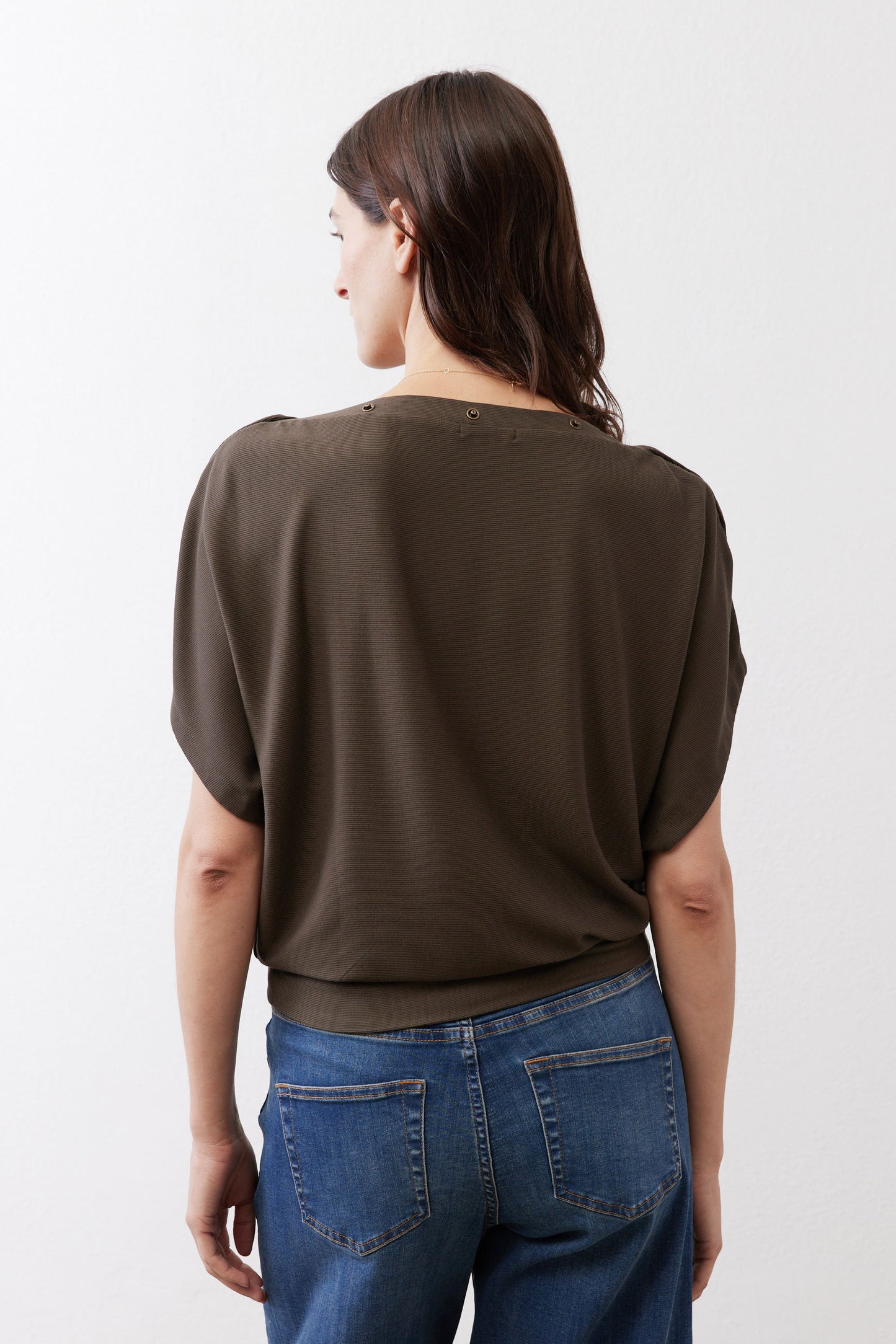 Olive short sleeve top with back view and slightly dropped shoulders