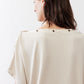 Cream short-sleeve back top with two-button shoulder detail