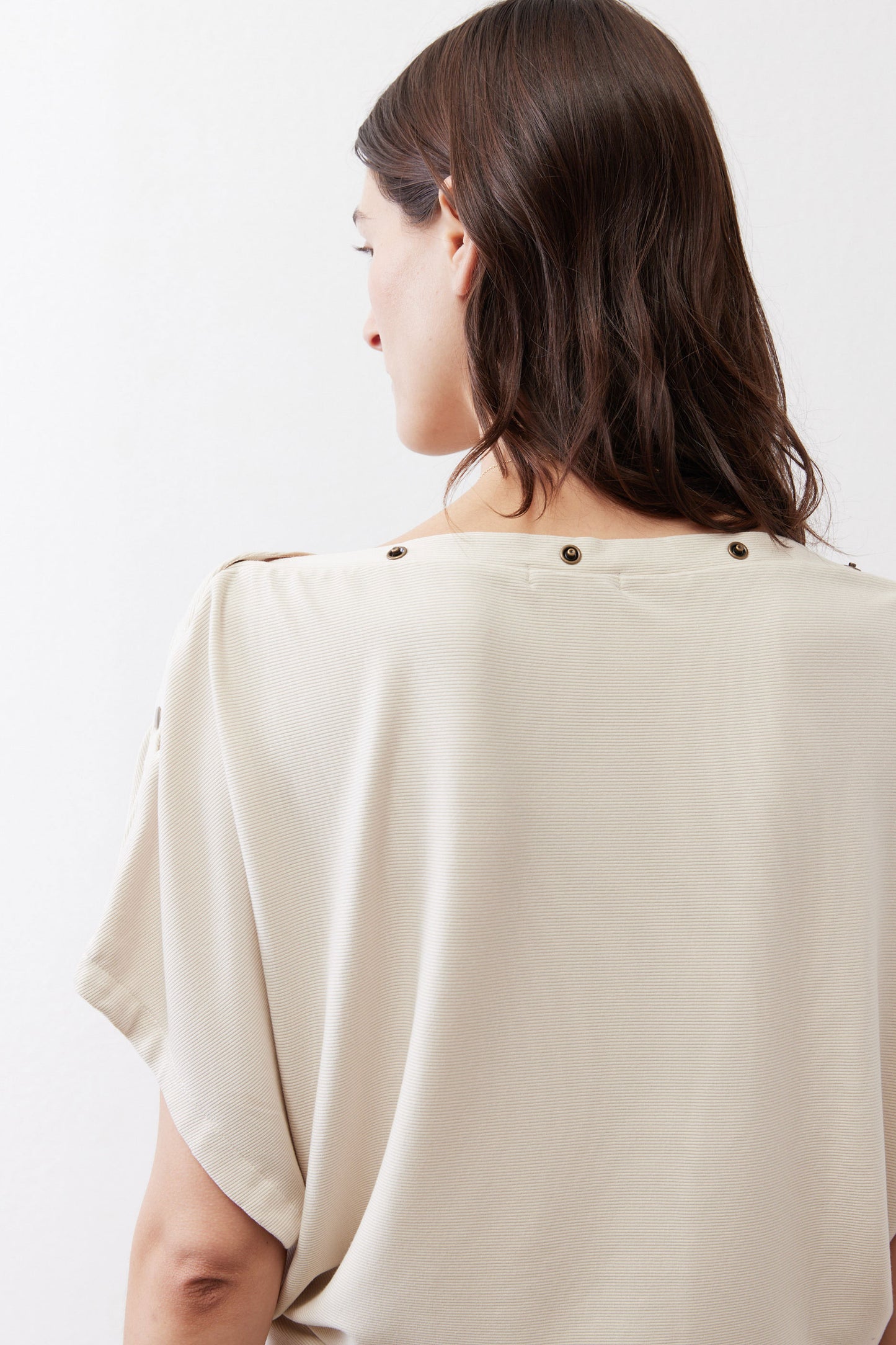 Cream short-sleeve back top with two-button shoulder detail