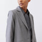 Gray melange squared off blazer front view with square lapels and flap pockets