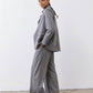 Gray melange squared off blazer side view with square lapel and flap pocket