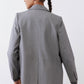 Gray melange blazer back view with center seam and two-button cuff