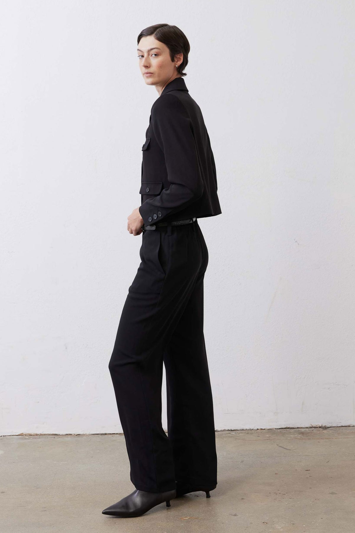 Black straight-leg pants, side view with wide straight cut