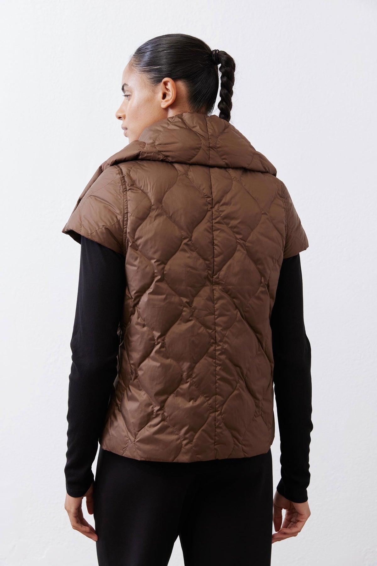 Coffee brown quilted down vest, back view with padded yoke and stand collar