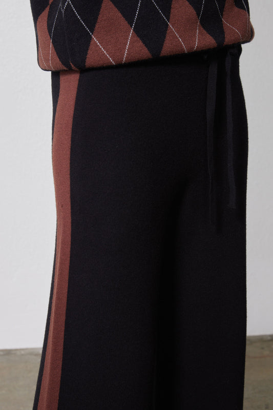 Black lounge pants with chestnut side stripe and elastic waistband
